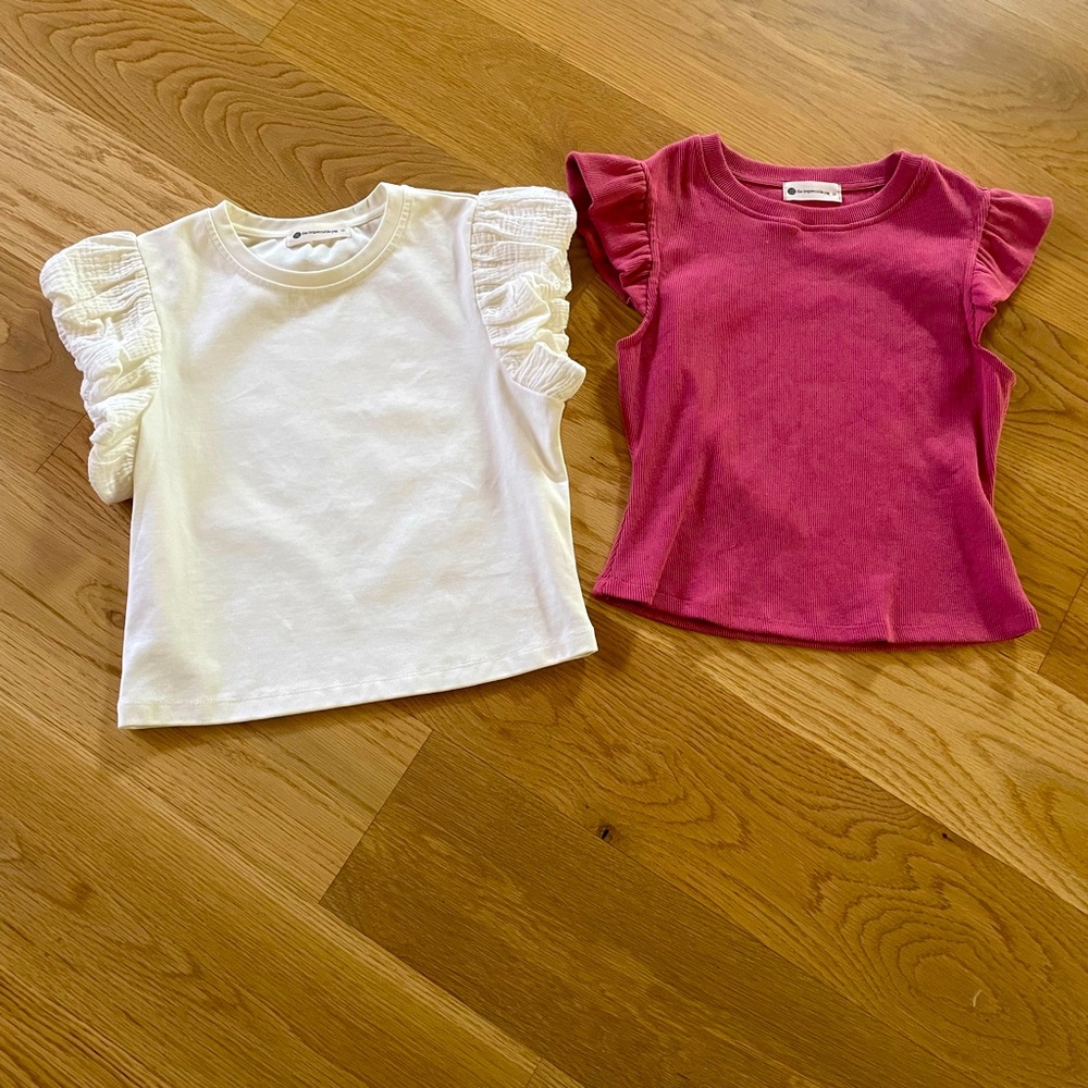Two tank tops, worn once.
